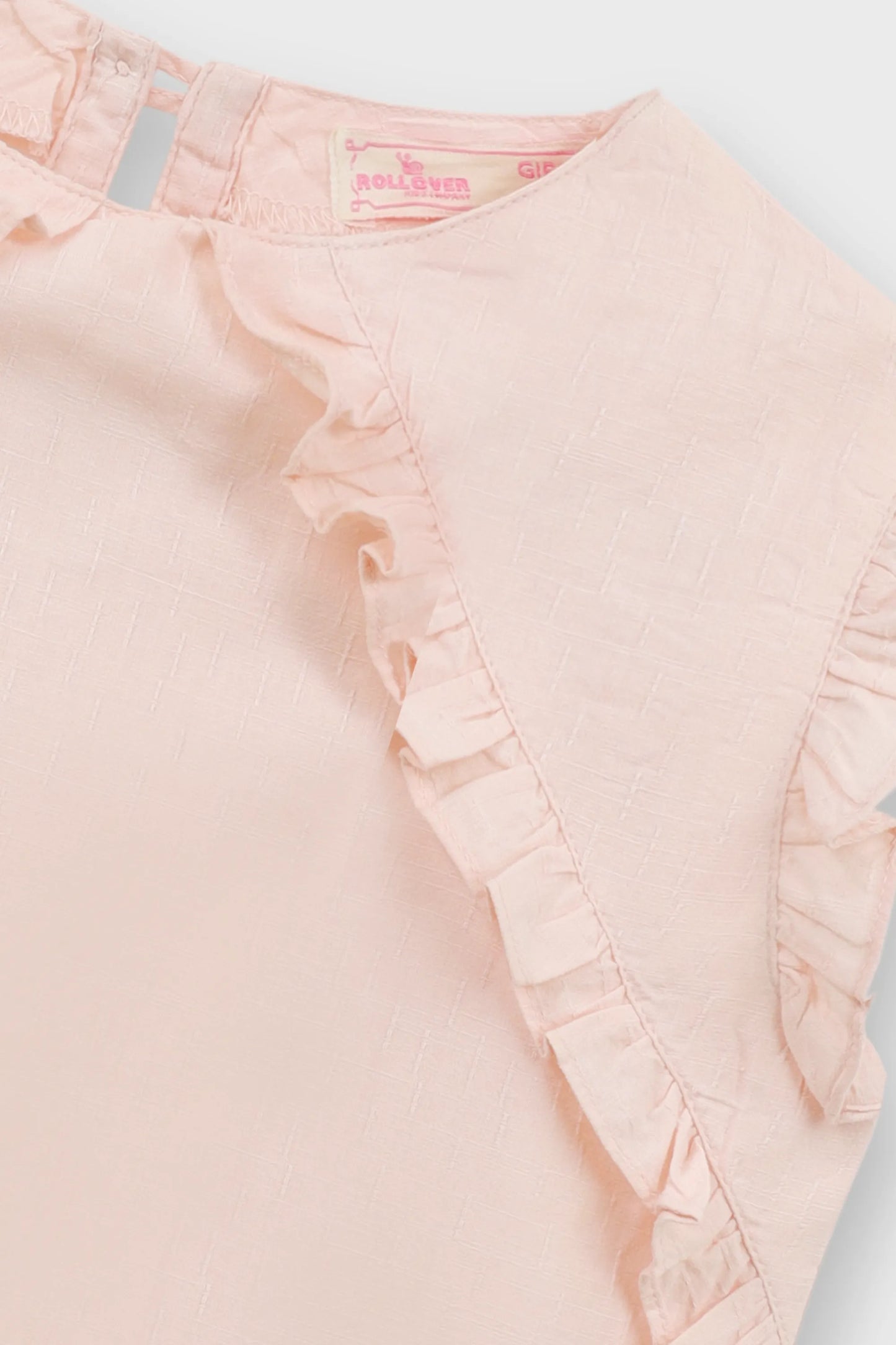 بلوزة قطنية فضفاضة باللون الوردي الفاتح